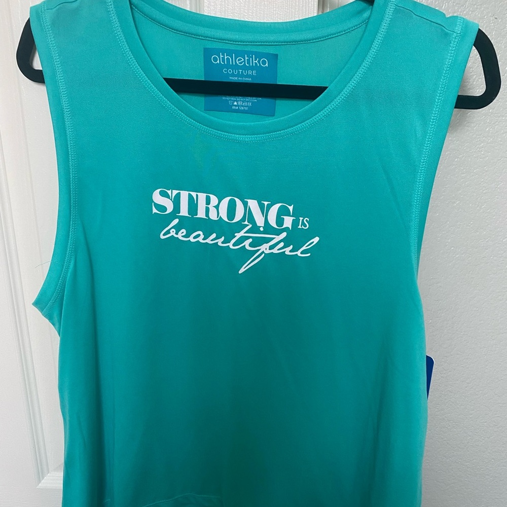 Women's tank top, new with tags. Size Large.